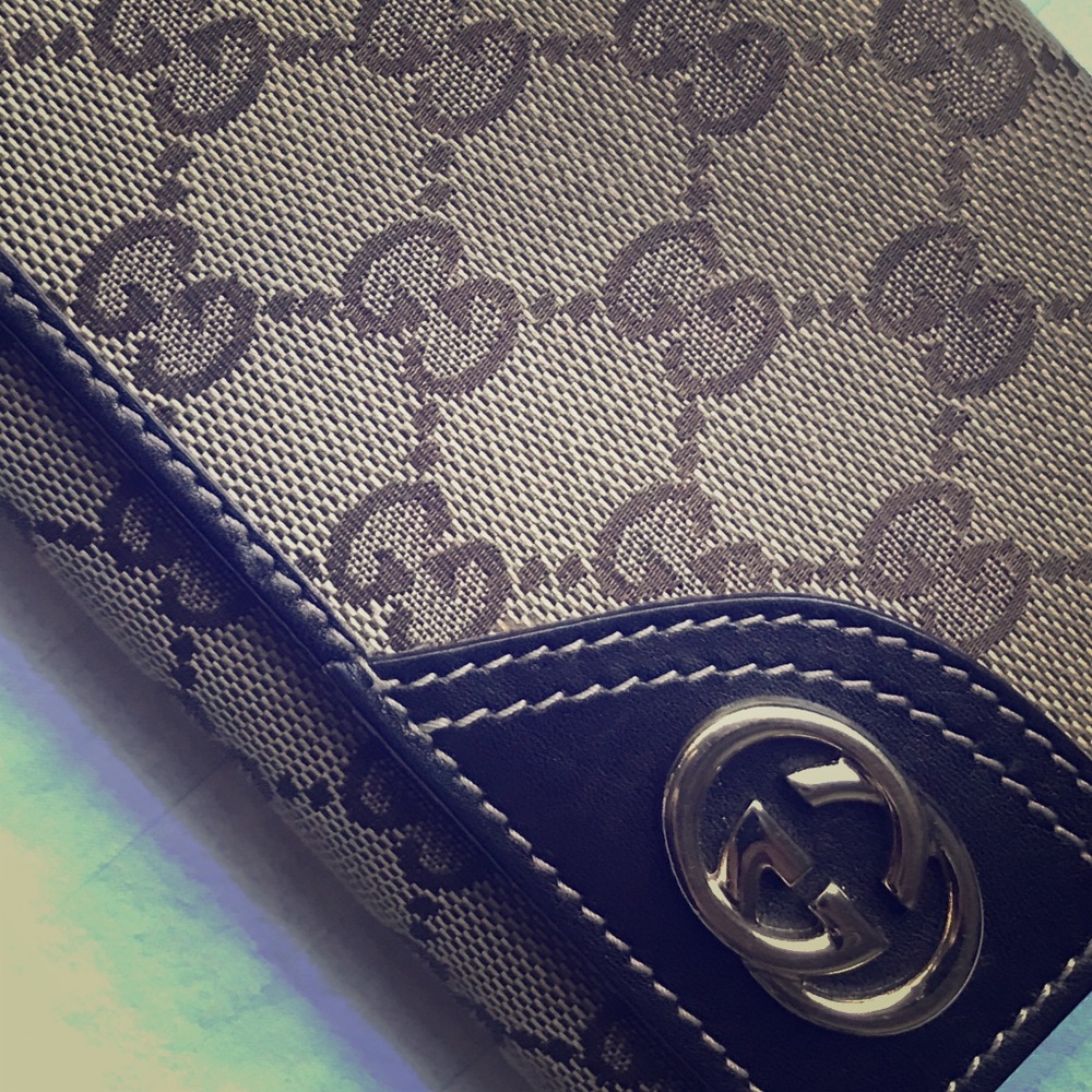 Gucci GG New Britt leather/canvas trifold wallet